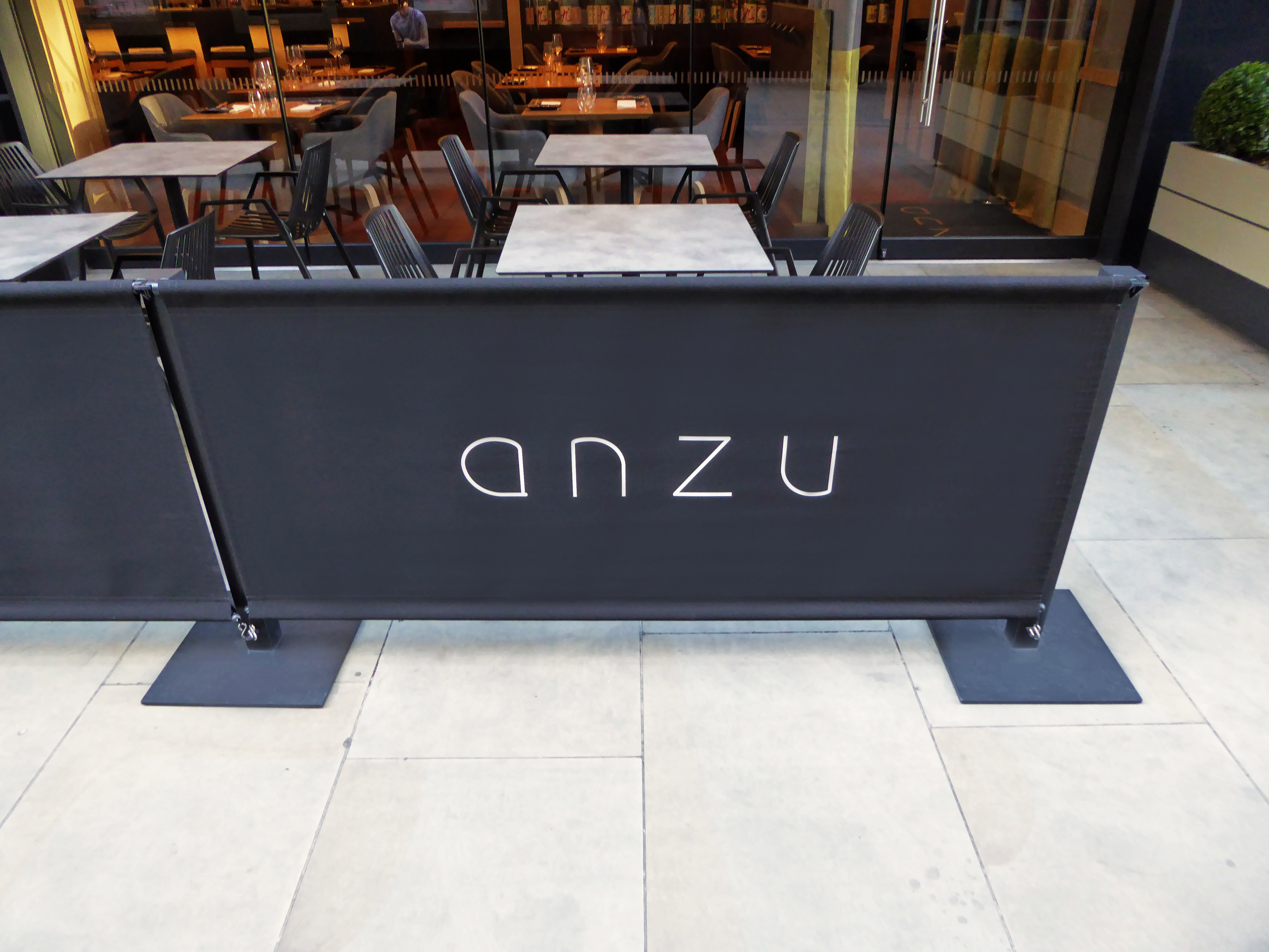 Wallstreet cafe barriers with text