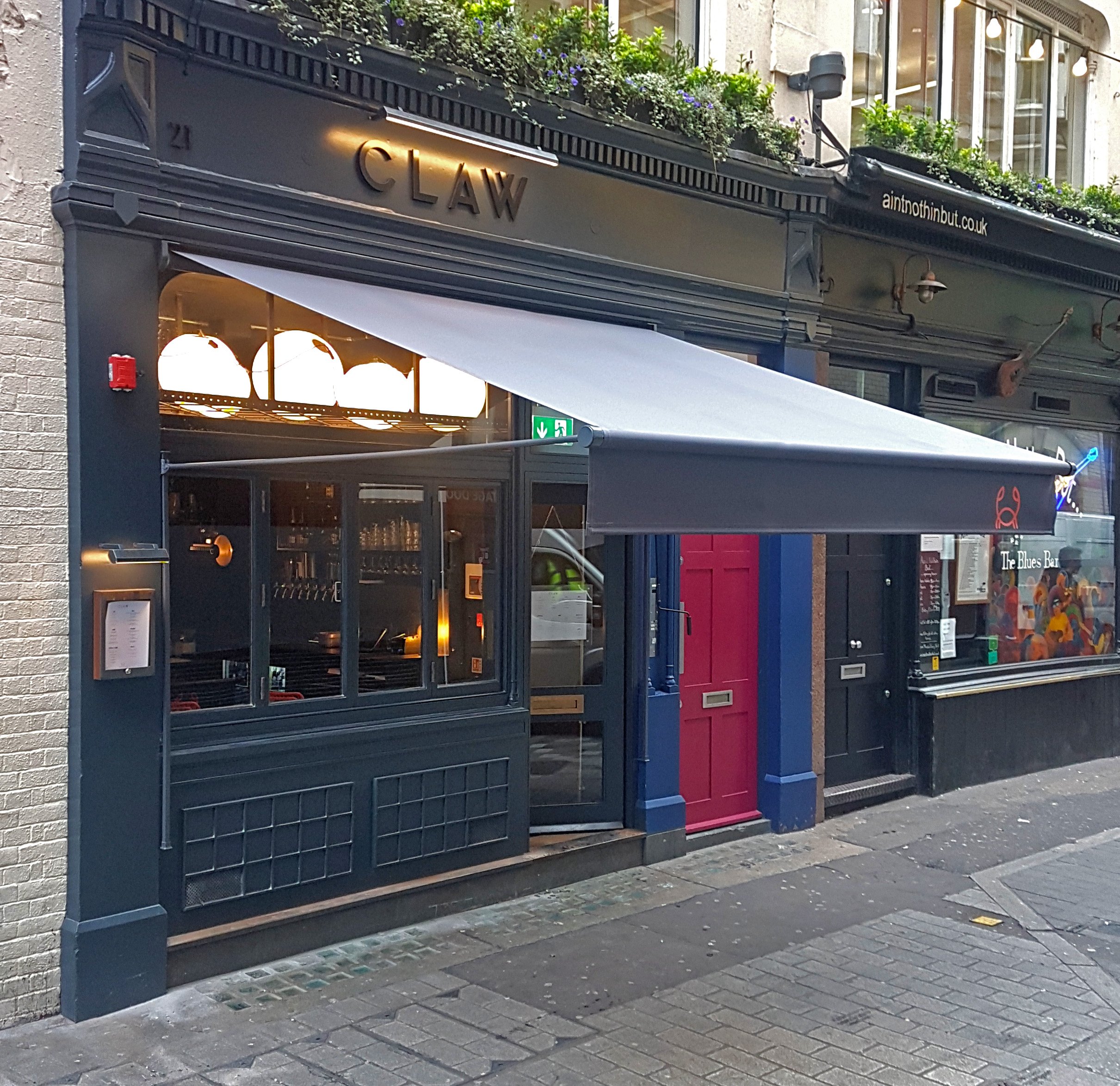 Greenwich awning CLAW Restaurant