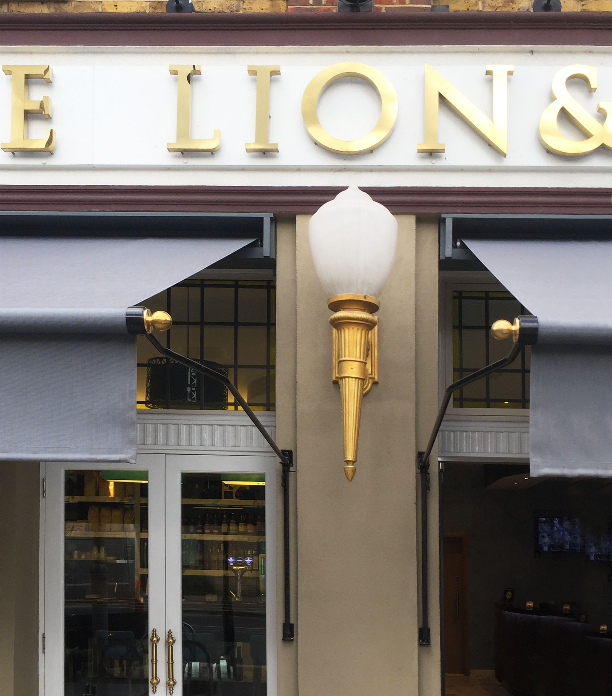 Lion & key awnings