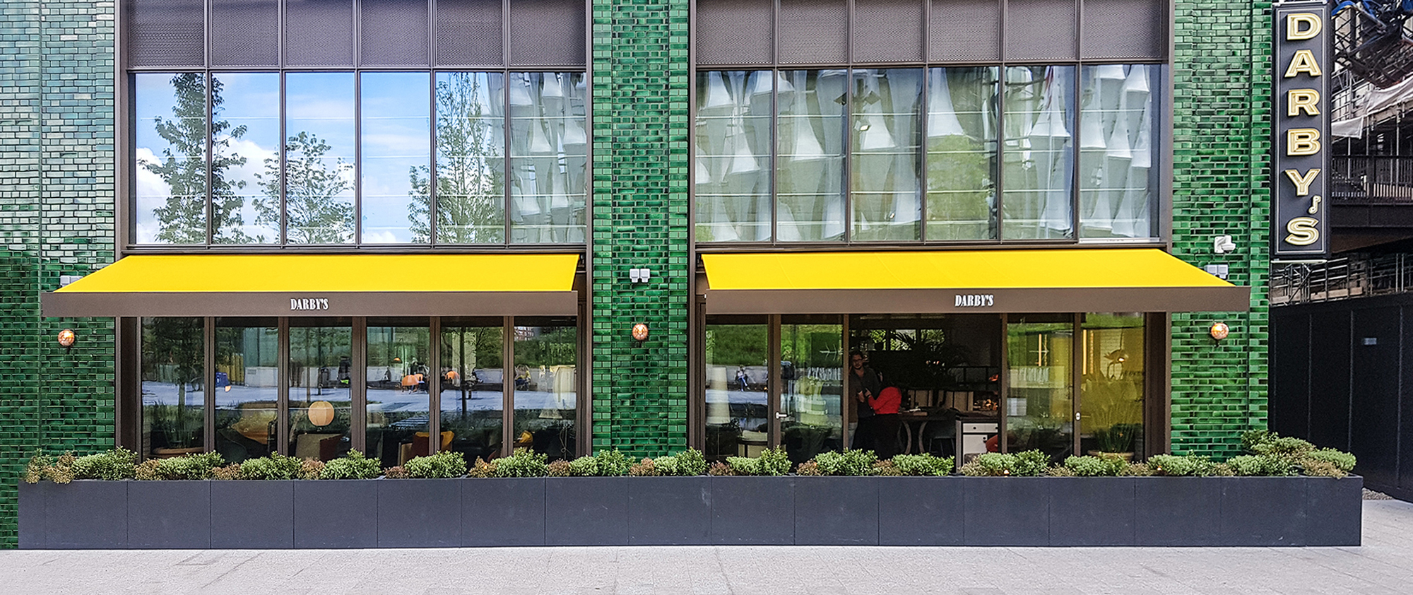 SQ2 awnings with bespoke encasement for Darby’s at Embassy Gardens, London.