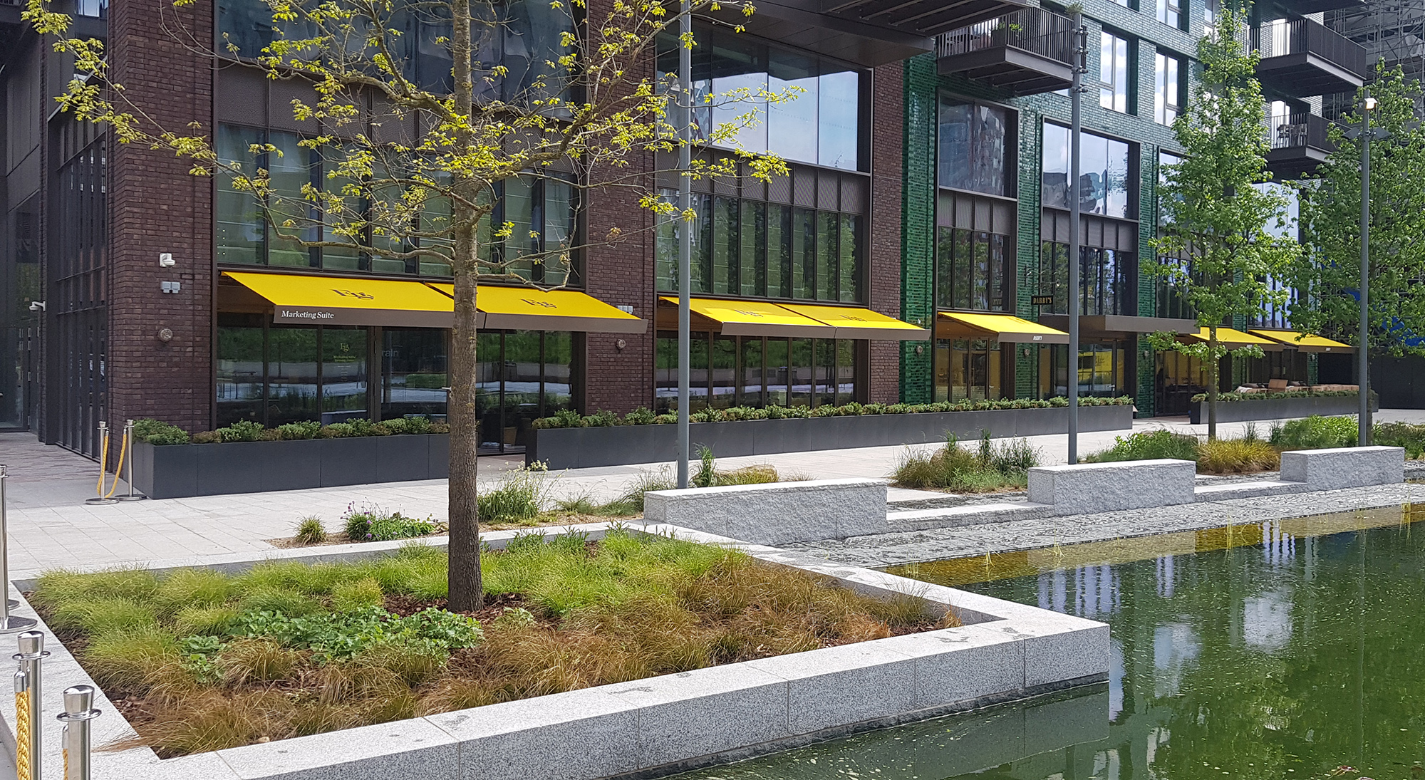 SQ2 awnings with bespoke encasement for Darby’s at Embassy Gardens, London.