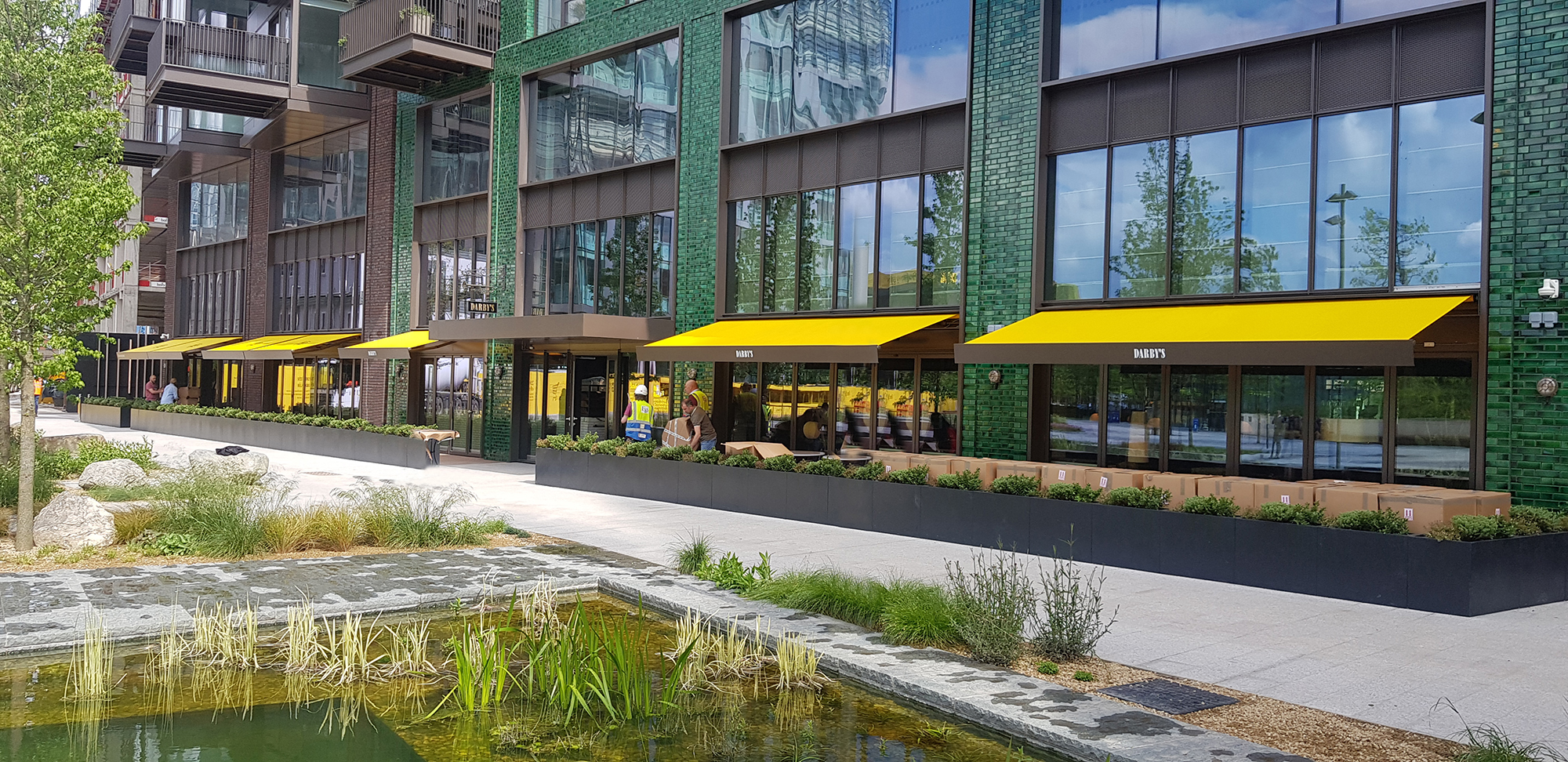 SQ2 awnings with bespoke encasement for Darby’s at Embassy Gardens, London.