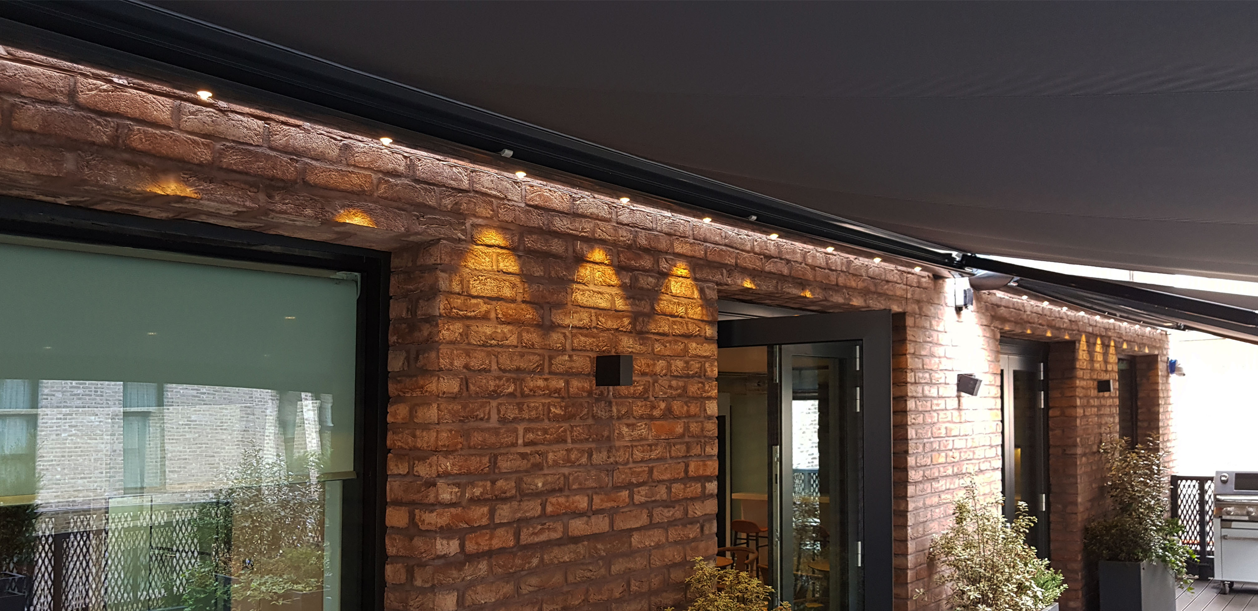Zenara awnings at Spring Mews with LED Lights