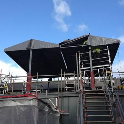 Parisian roof terrace awning being constructed at Harrods Depository 