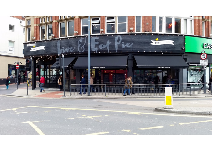 Traditional awning styling for contemporary pie and mash shop